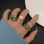 6 Pcs/Set Of Golden-Tone Metal Rings With Green Gemstones